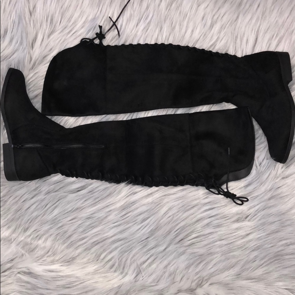 Over the knee black boots